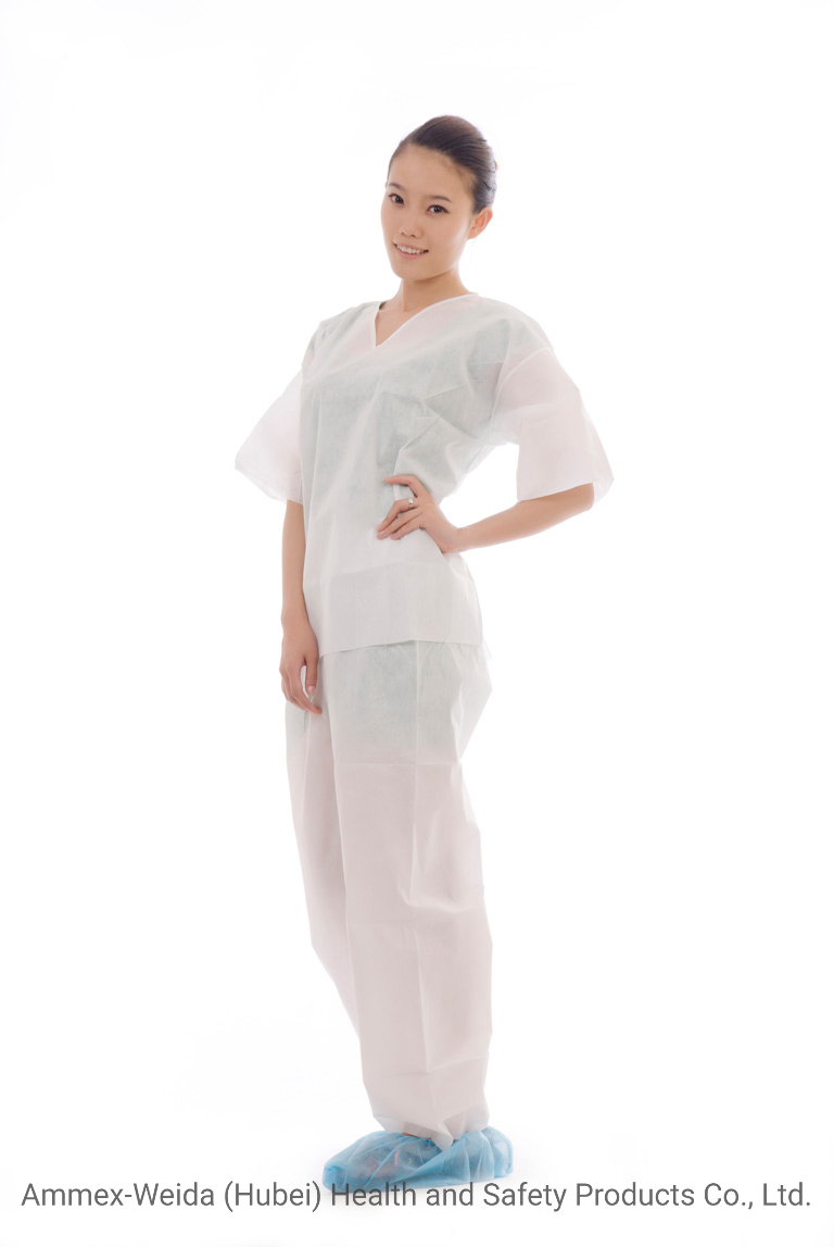 Kits de pijamas desechables con camisa y pantalones para uso médico en sala de operaciones de hospital