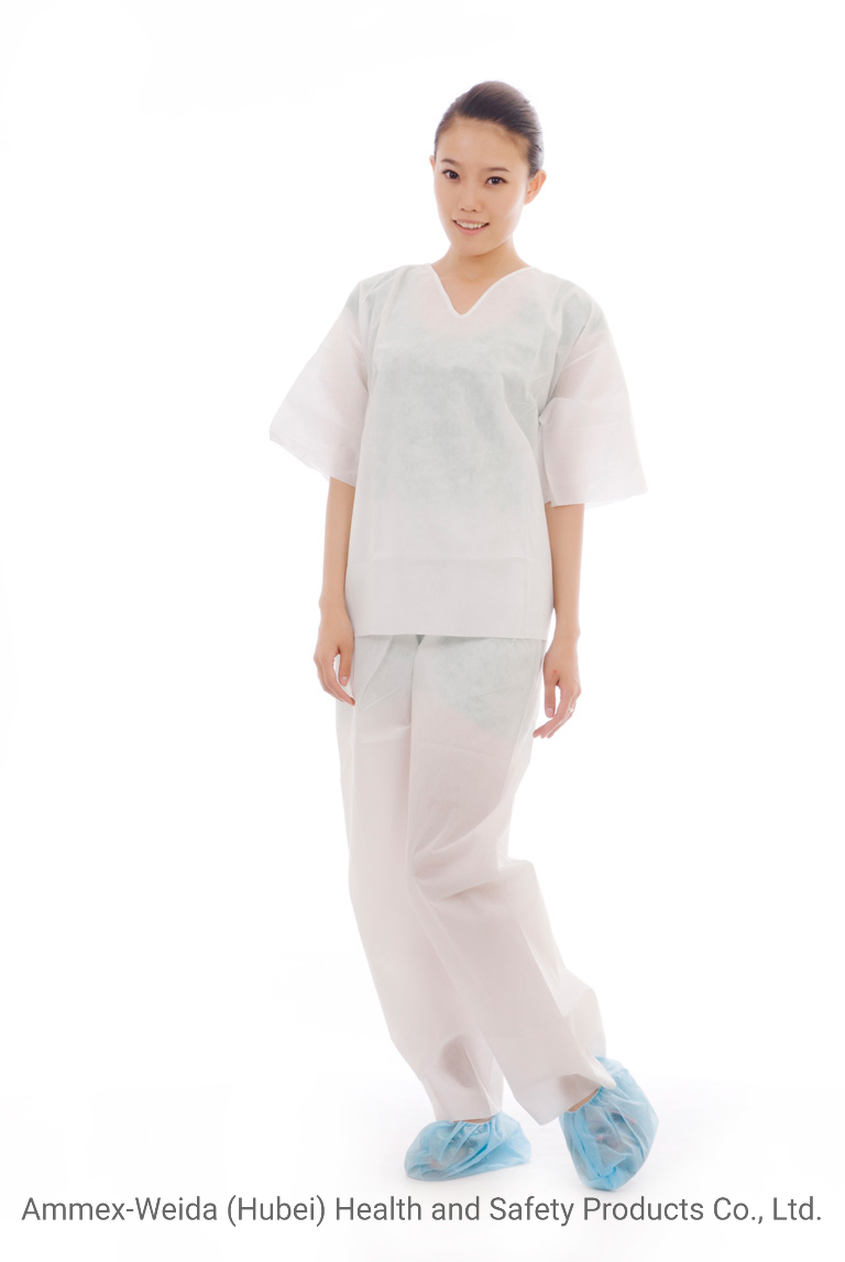 Kits de pijamas desechables con camisa y pantalones para uso médico en sala de operaciones de hospital
