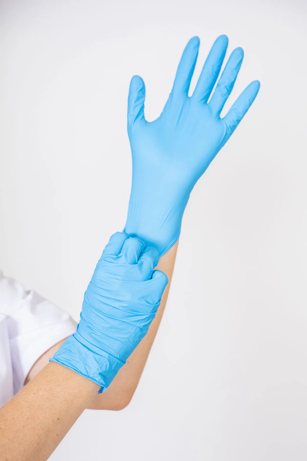 Luvas Protetoras Estéreis de Nitrilo para Clínica Cirúrgica Descartáveis Siny China com Superfície Lisa e Texturizada