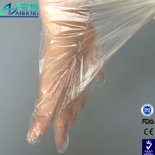 Luvas descartáveis de plástico PE transparentes e impermeáveis para manuseio de alimentos