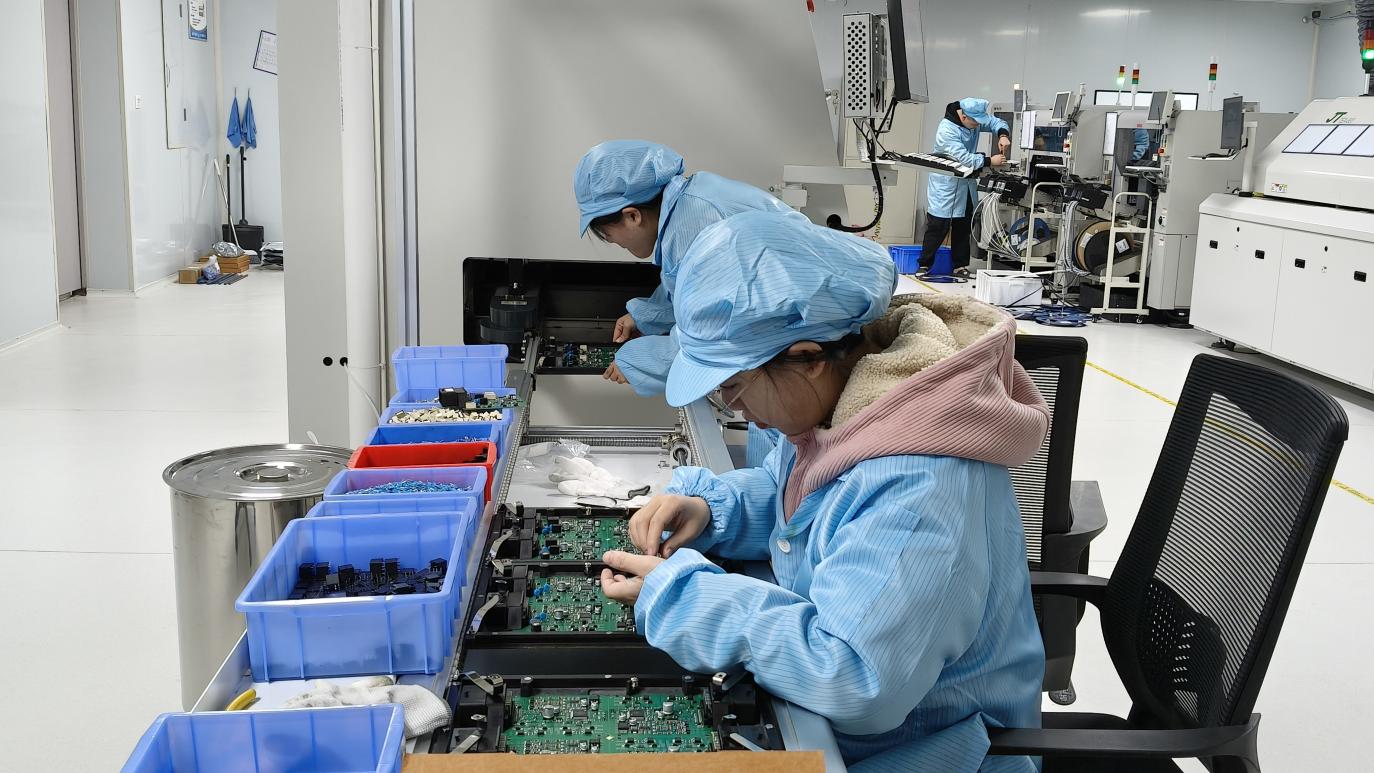 Plug-in assembly process at OneAll Lights manufacturing facility