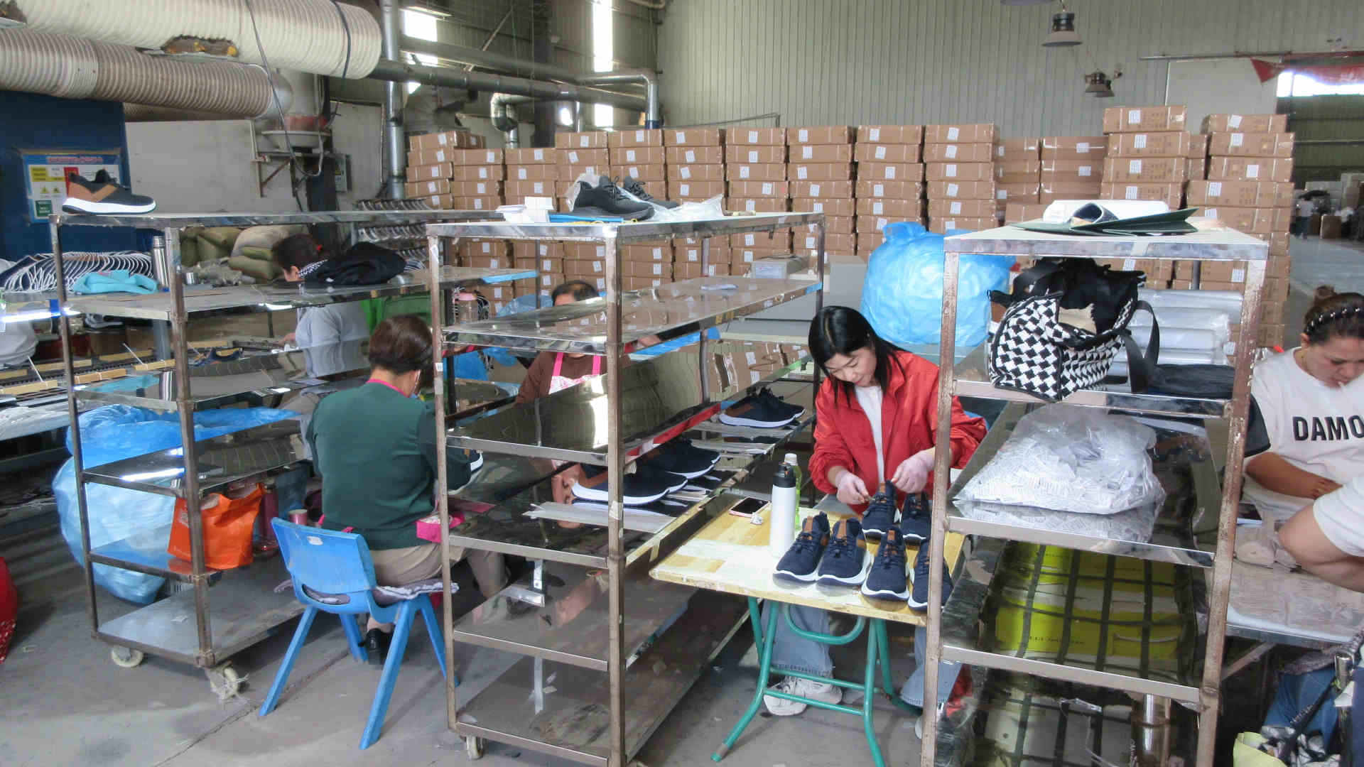 Packaging process — professional shoe packaging and quality inspection before export shipment
