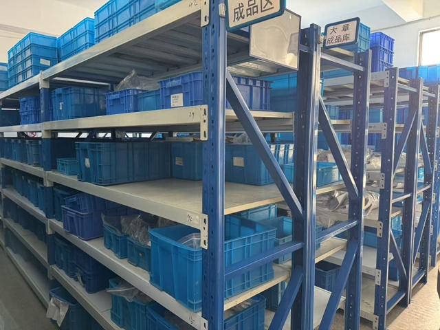 Finished orthopedic implant inventory in temperature-controlled storehouse awaiting global shipment