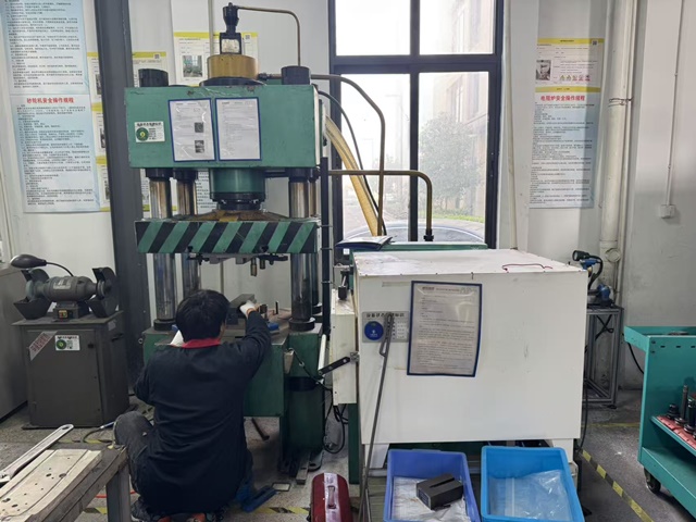 Precision stamping process for orthopedic implant component manufacturing at Osteora facility