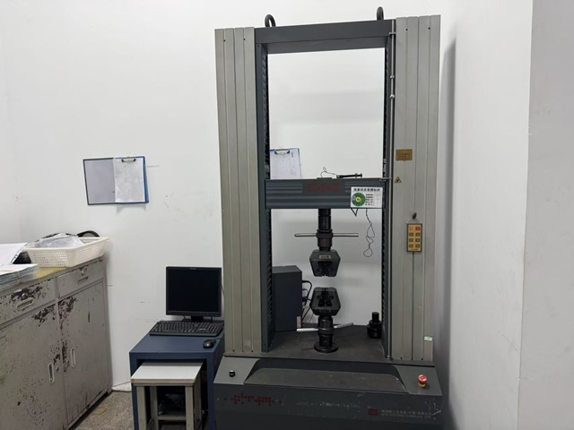Multifunctional mechanical testing machine for tensile strength and fatigue testing of orthopedic implants