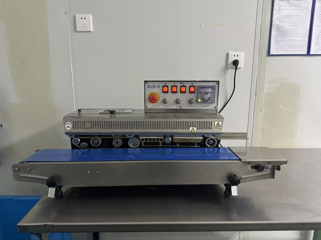 Automated packaging machine for sterile packaging of finished orthopedic implant products