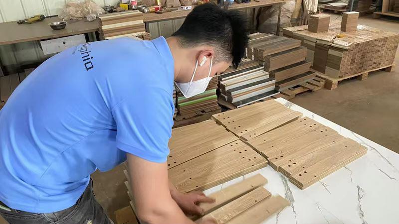 Final inspection and export packaging of furniture at Oakes Furniture Co. Ltd.