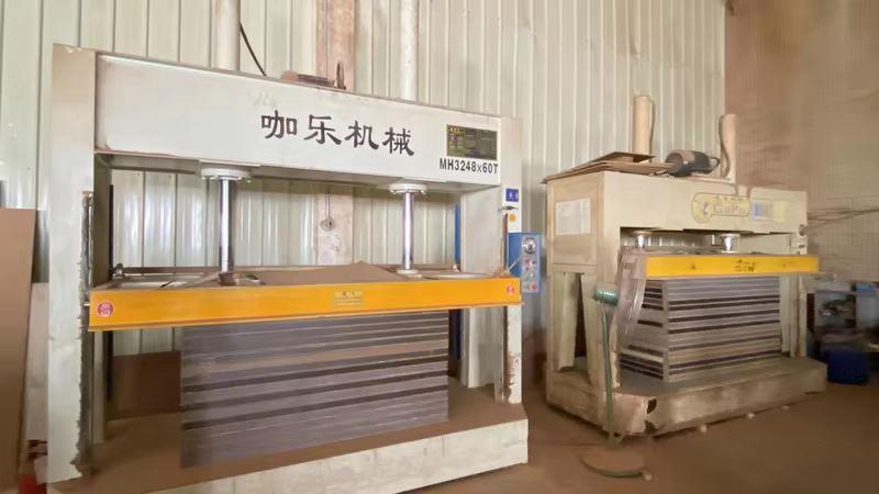 Hydraulic pressing machine for furniture board lamination at Oakes factory