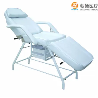 Folding massage table