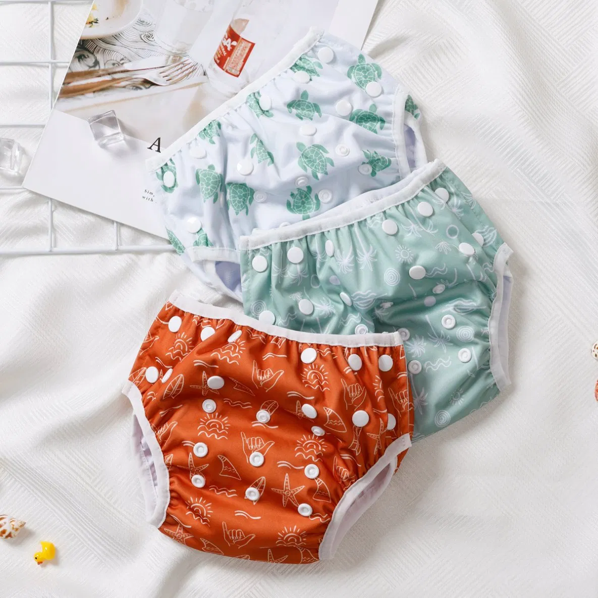 Pañales de tela para nadar reutilizables y lavables con broches laterales personalizados, pantalones de baño para bebés y niños, ropa interior para piscina y playa