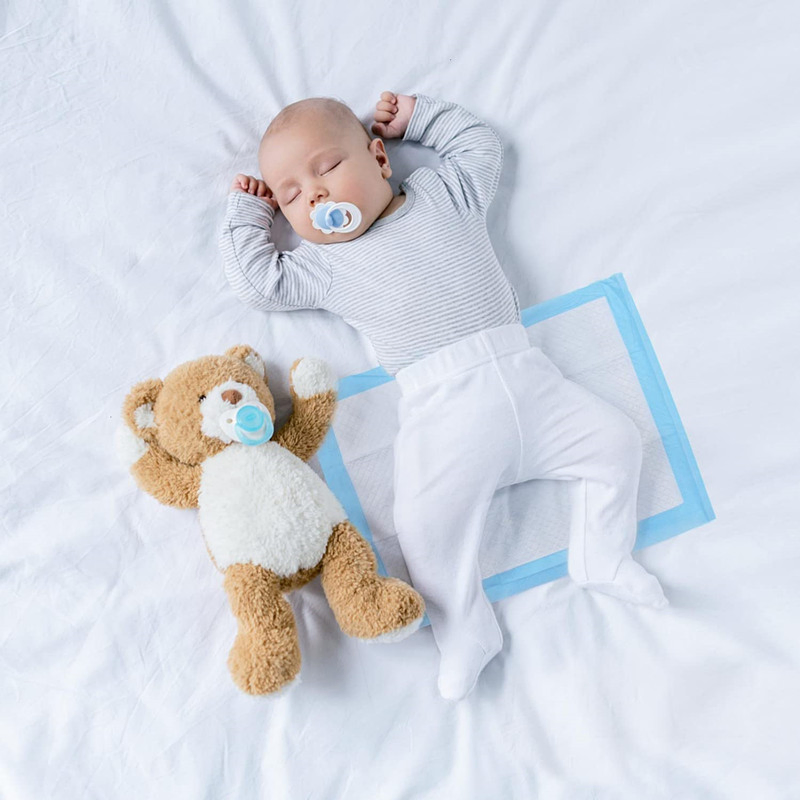 Muestra gratuita personalizada 20 paquete de almohadilla desechable para bebés, almohadilla para cambiar, transpirable, impermeable, almohadilla para orina de bebé, pañal para bebé con certificado Reach