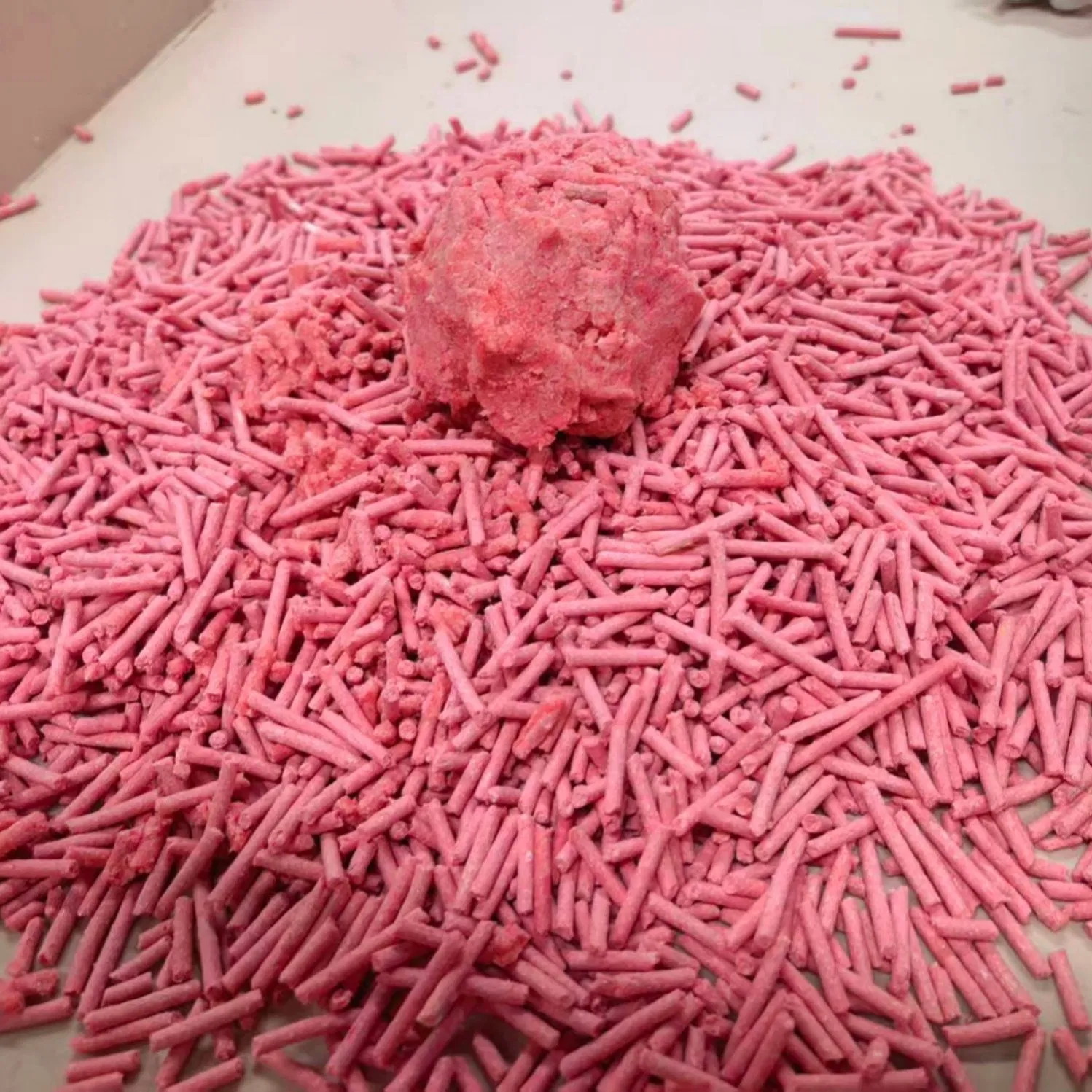 Hypoallergenic Peach Scented Tofu Cat Litter Made From Biodegradable Plant Fibers Featuring Fast Absorption Into Solid Clumps Lightweight and Gentle on Feet