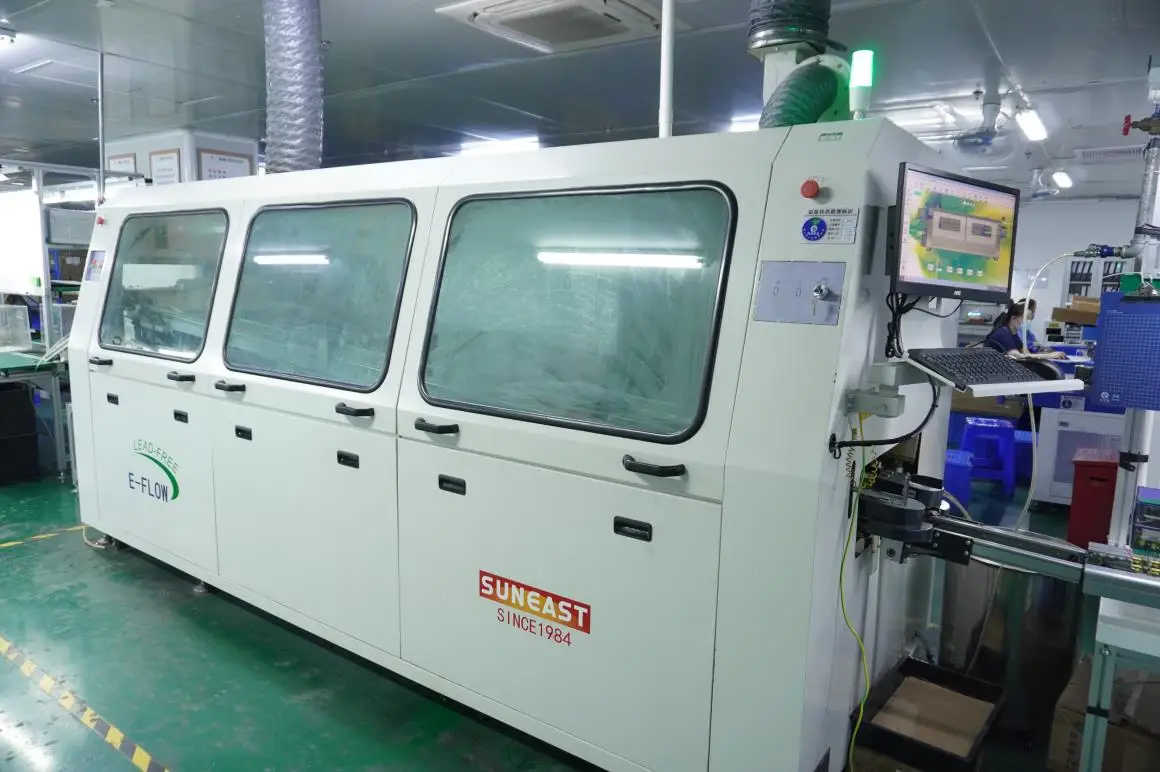 Wave soldering production line at Laisen Electronics