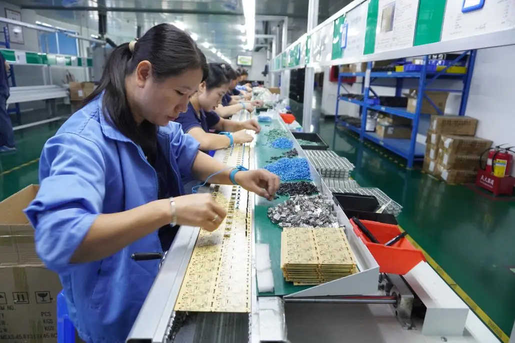 Plug-in component assembly process at Laisen factory