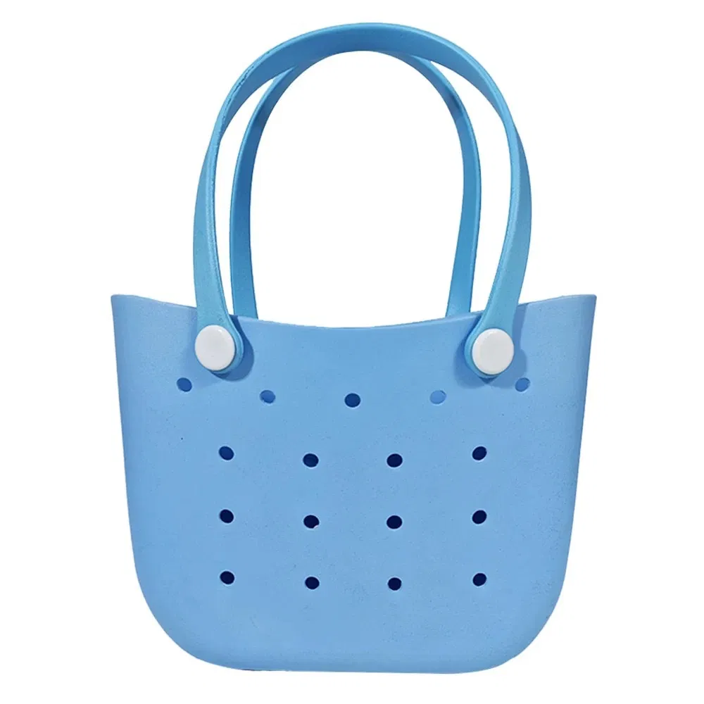 Bolsa de playa portátil, ligera, impermeable y lavable, con diseño simple en forma de luna perforada