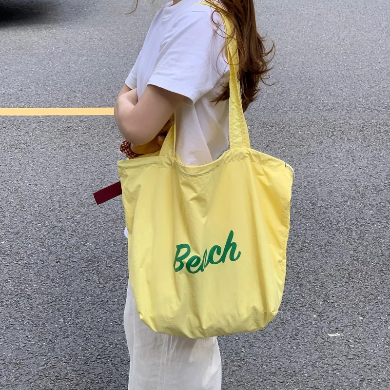 Bolsa de compras personalizada para damas, bolsa de playa ligera de nylon con cordón para mujeres, verano
