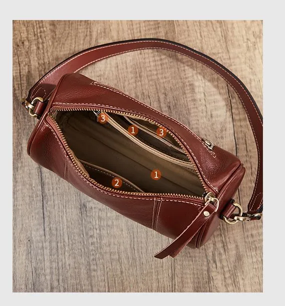 Bolso cruzado de cuero genuino vintage personalizado de fábrica, nuevo bolso cilíndrico de temperamento, bolso simple de axila suave para un solo hombro, bolso de barril para damas