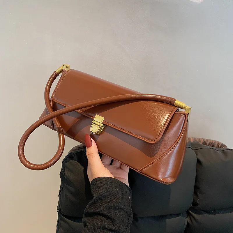Bolso pequeño cuadrado francés de moda para mujer, nuevo bolso de moda de alta calidad, textura, bolso de hombro único, bolso baguette