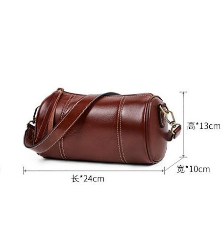 Bolso cruzado de cuero genuino vintage personalizado de fábrica, nuevo bolso cilíndrico de temperamento, bolso simple de axila suave para un solo hombro, bolso de barril para damas