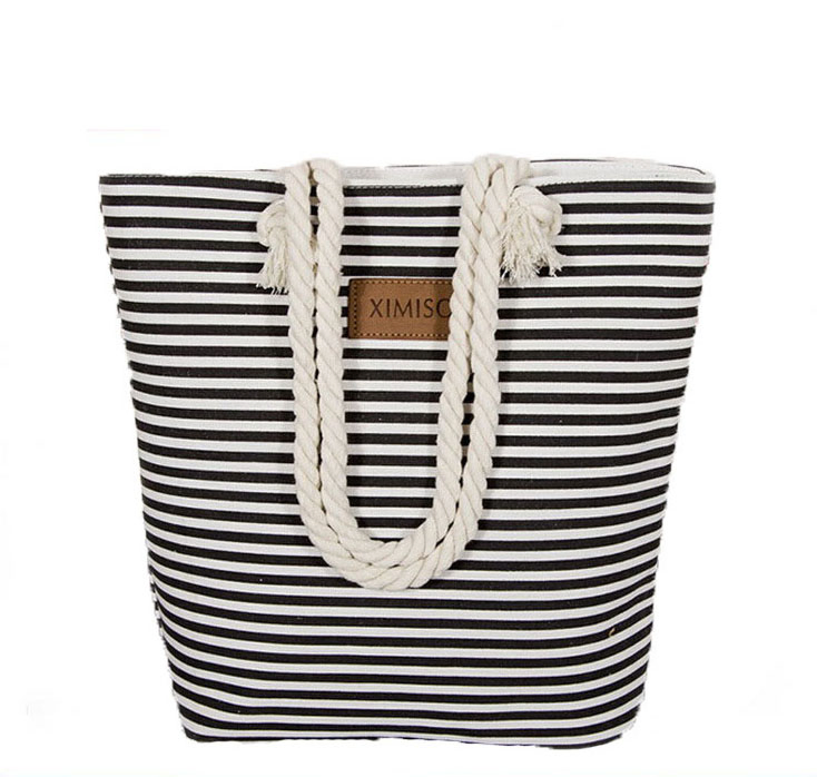 Distribuidor de fabricación en China al por mayor de moda para mujeres, bolso de supermercado personalizado, bolsa de playa de mano plegable con asas de cuerda de lona para viajes y compras