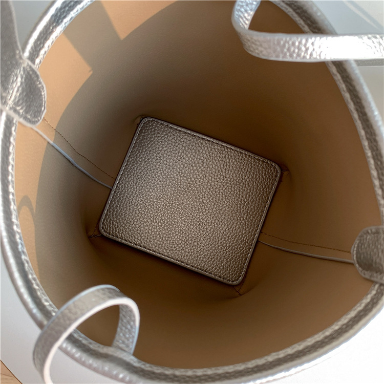 Bolso de mano femenino de gran capacidad, textura, bolso cilíndrico para el brazo, diseño de nicho suave de PU, bolso de cuero abrasivo tipo cubo