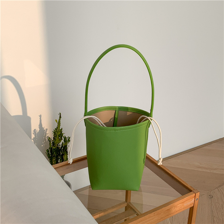 Bolso de mano femenino de gran capacidad, textura, bolso cilíndrico para el brazo, diseño de nicho suave de PU, bolso de cuero abrasivo tipo cubo