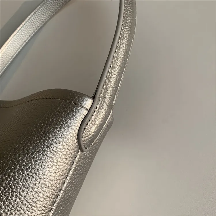 Bolso de mano femenino de gran capacidad, textura, bolso cilíndrico para el brazo, diseño de nicho suave de PU, bolso de cuero abrasivo tipo cubo