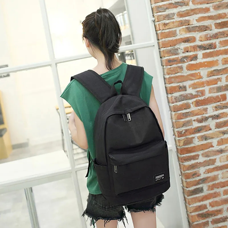 Mochila escolar para adolescentes de nylon impermeable al por mayor para exteriores