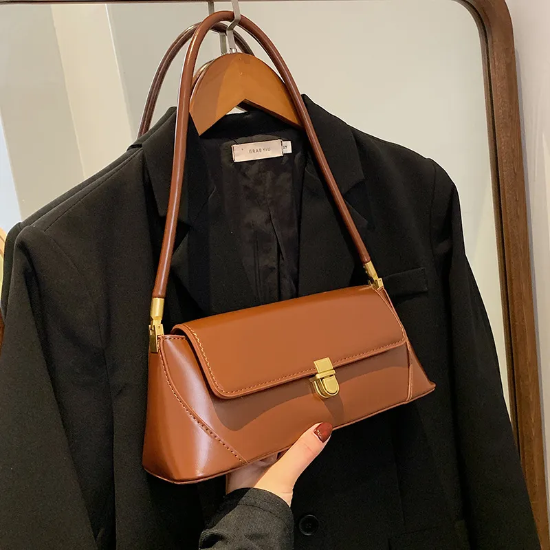 Bolso pequeño cuadrado francés de moda para mujer, nuevo bolso de moda de alta calidad, textura, bolso de hombro único, bolso baguette