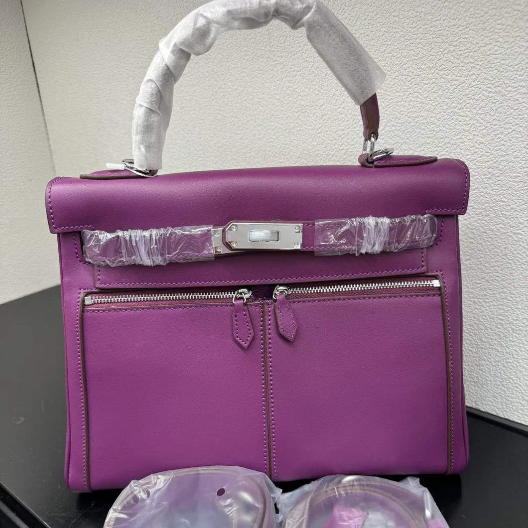 2025 Nueva bolsa de cesta de verduras de piel de vaca con grano de lichi, versión coreana del estilo minimalista, bolso casual tipo cubo para mujeres