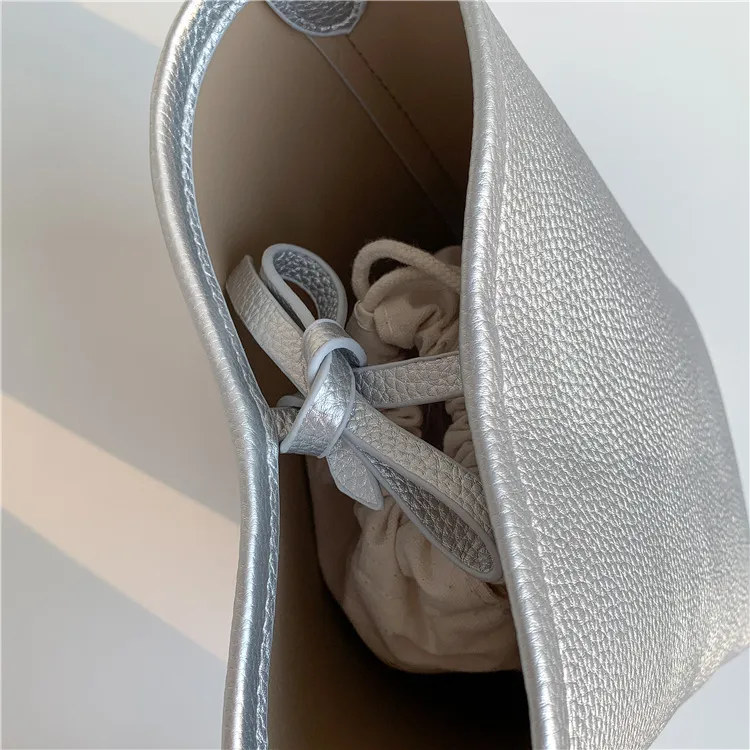 Bolso de mano femenino de gran capacidad, textura, bolso cilíndrico para el brazo, diseño de nicho suave de PU, bolso de cuero abrasivo tipo cubo