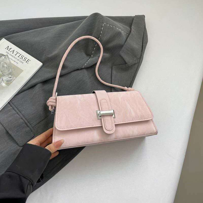Bolso de hombro de PU texturizado con asa anudada y hebilla de metal, bolso pequeño