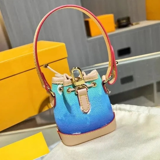 2025 Nuevos bolsos clásicos de mano, bolsas de mano, marca, colorido degradado, letra, estampado de cuadros, bolso pequeño tipo cubo