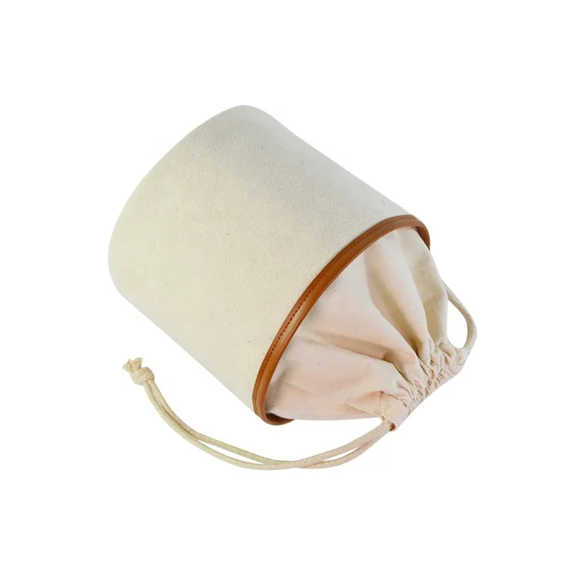Bolsa organizadora de maquillaje de viaje con forma de barril y cordón