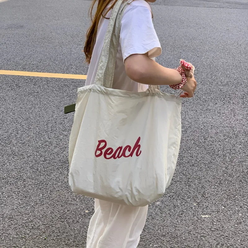 Bolsa de compras personalizada para damas, bolsa de playa ligera de nylon con cordón para mujeres, verano