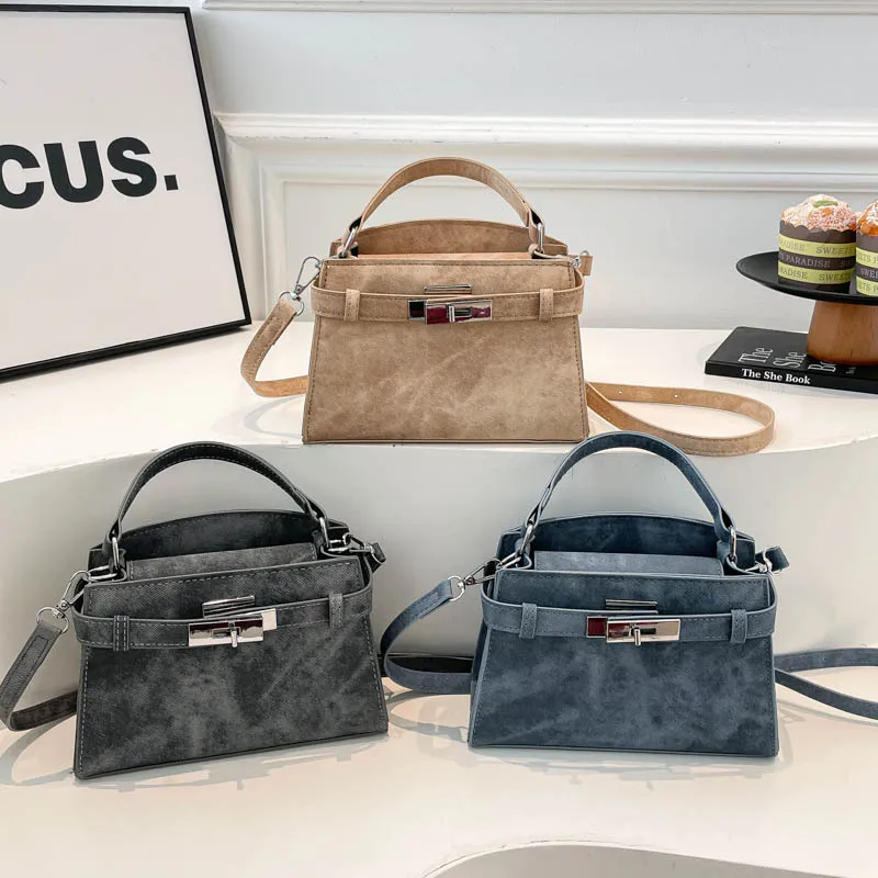 Bolsa de cubo de doble cremallera estilo coreano al por mayor para mujeres, 2026 nuevo estilo de verano, bolsa de hombro de lujo ligero, bolsa cruzada de cadena de moda