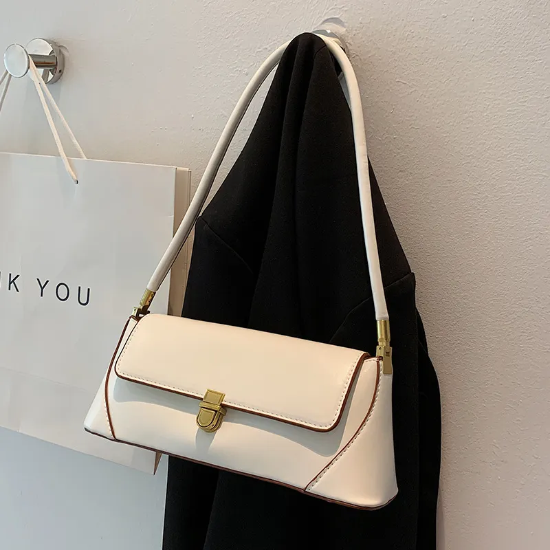 Bolso pequeño cuadrado francés de moda para mujer, nuevo bolso de moda de alta calidad, textura, bolso de hombro único, bolso baguette