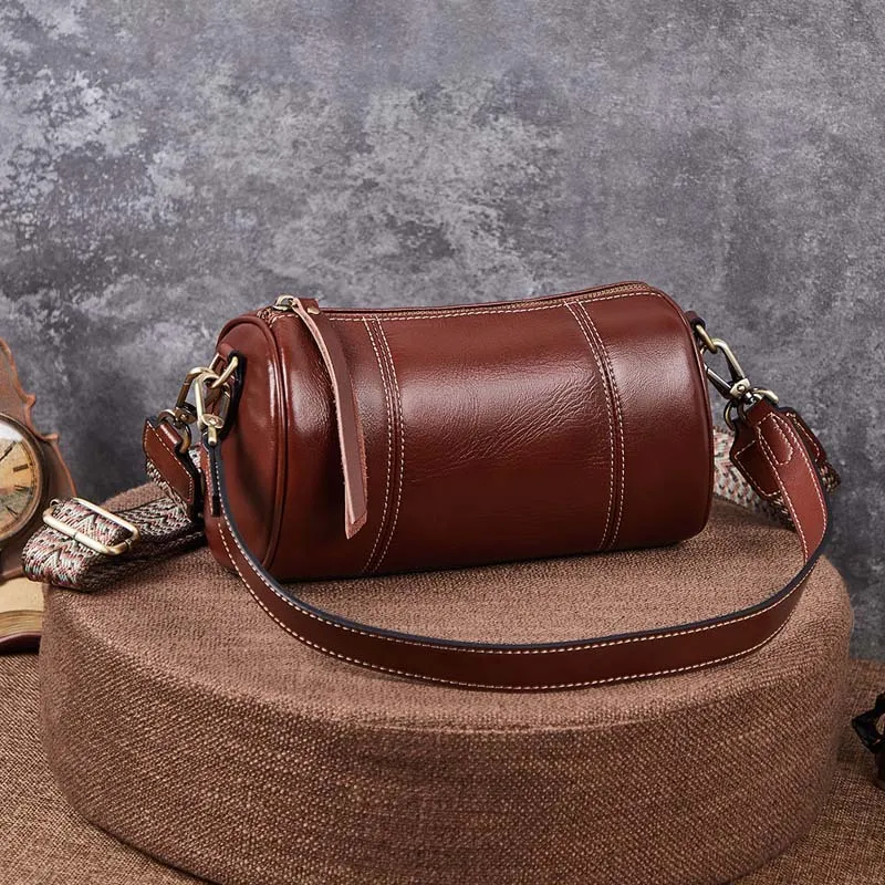 Bolso cruzado de cuero genuino vintage personalizado de fábrica, nuevo bolso cilíndrico de temperamento, bolso simple de axila suave para un solo hombro, bolso de barril para damas