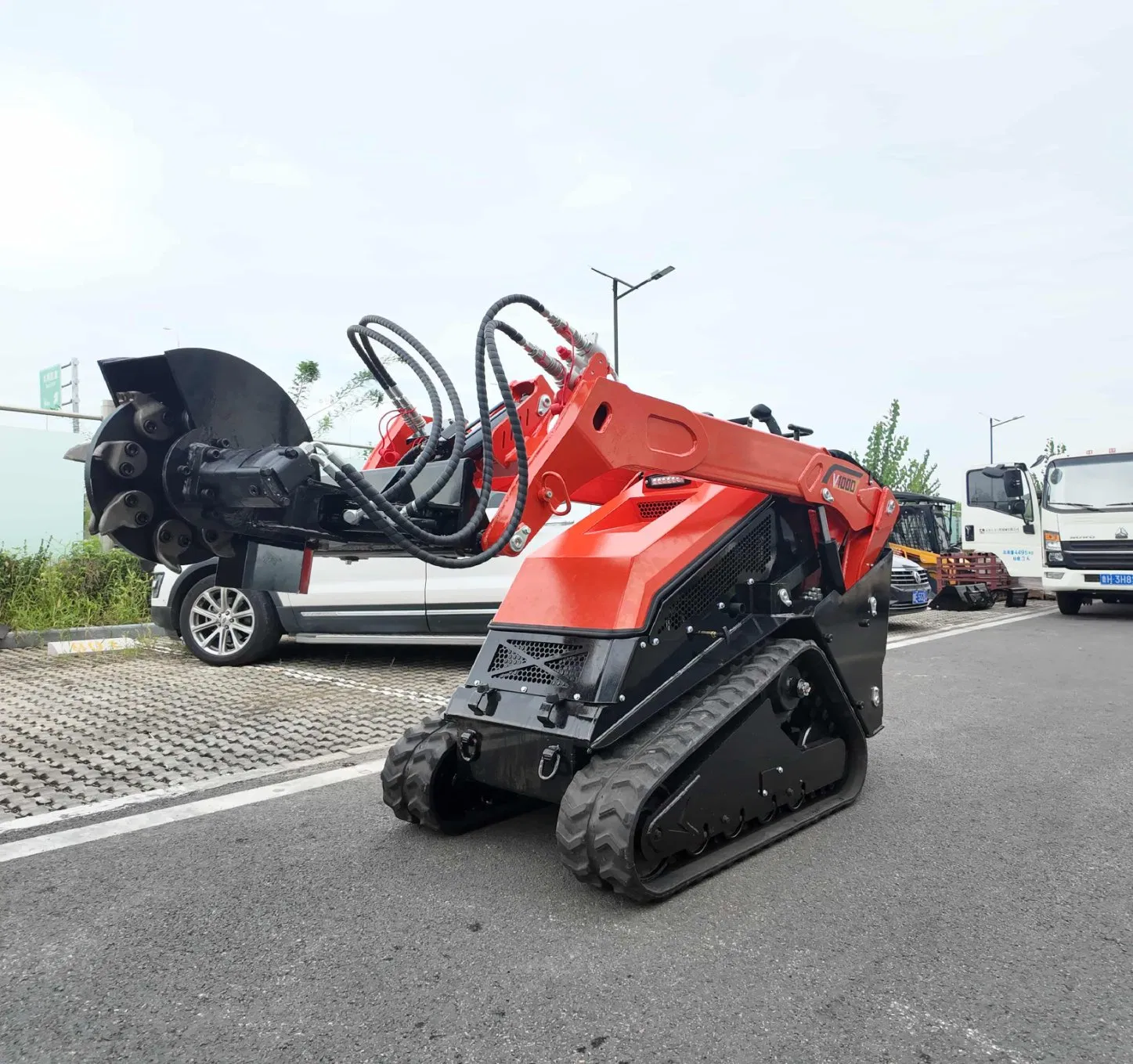 Safe Compact Track Loader with Attachments for Urban Streets