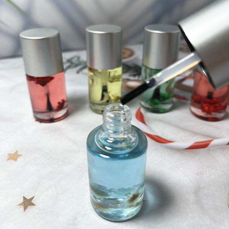 Private Label Nail Cuticle Oil with Vitamin E Scented Revitalizer Enriched by Natural Dried Flowers Softens Cares for Fingers