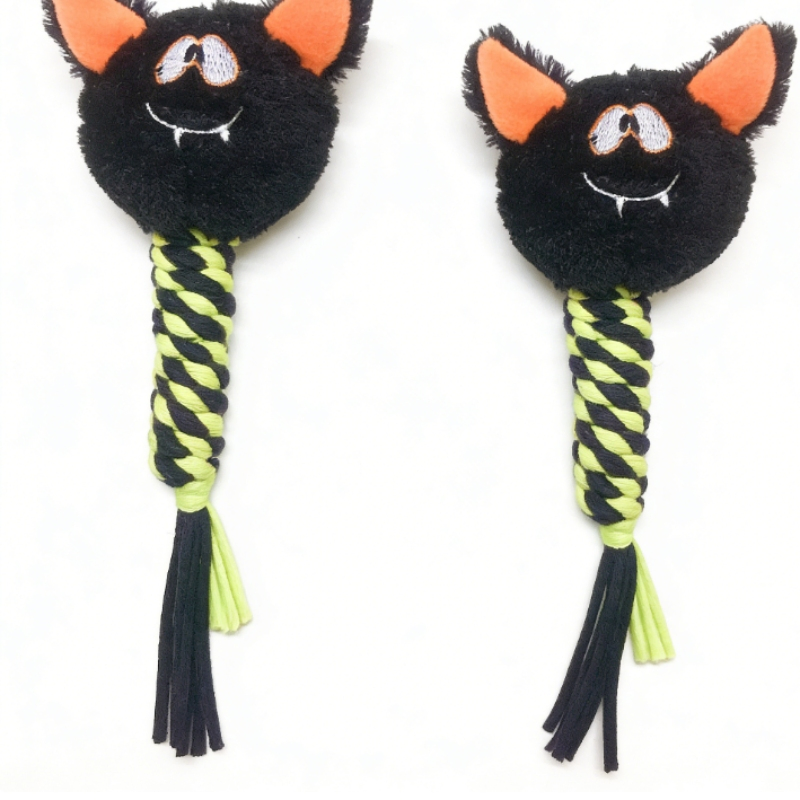 Juguete interactivo para perros de Halloween que fomenta comportamientos de juego de golpear y saltar