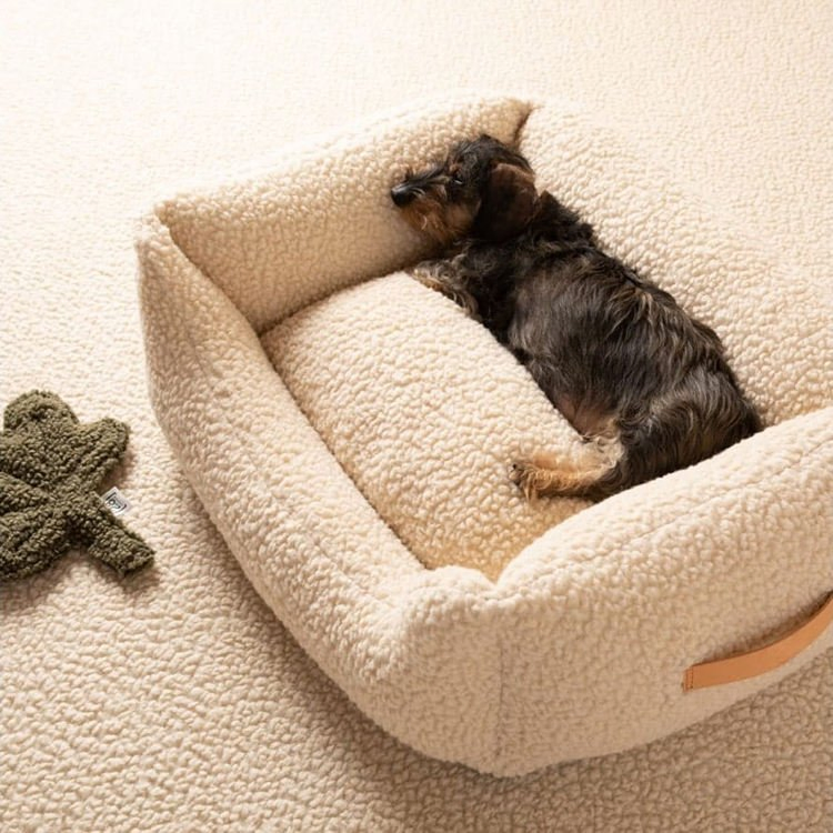 Cama de lujo de suave tela de lana para perros y gatos con bordado de logo personalizado, asa de cuero, cojín removible y lavable, nido de sueño duradero y cómodo para perros
