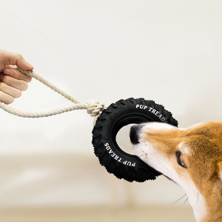 Juguete de masticar de cuerda dispensador de comida para perros interactivo de goma duradera