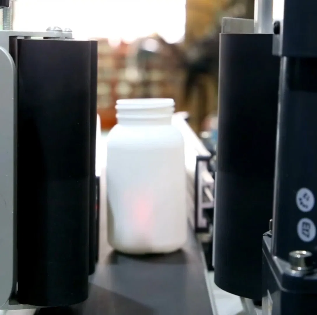 Ym415 Automatic Wrap Labeling Machine for Round Bottles with Touchscreen HMI