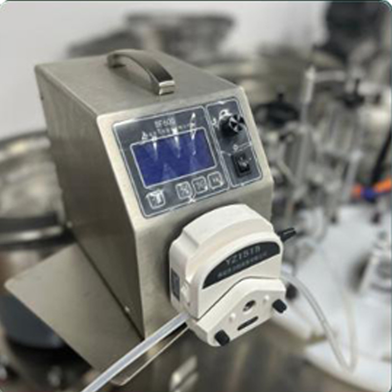 Automatic Screw Cap Small Bottle Liquid Monoblock Rotary Filling Capping Machine