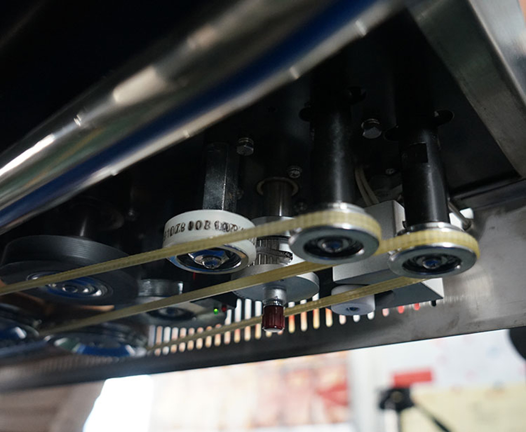 Vertical High Speed Continuous Band Sealer Heat Sealing Machine for Plastic Bag