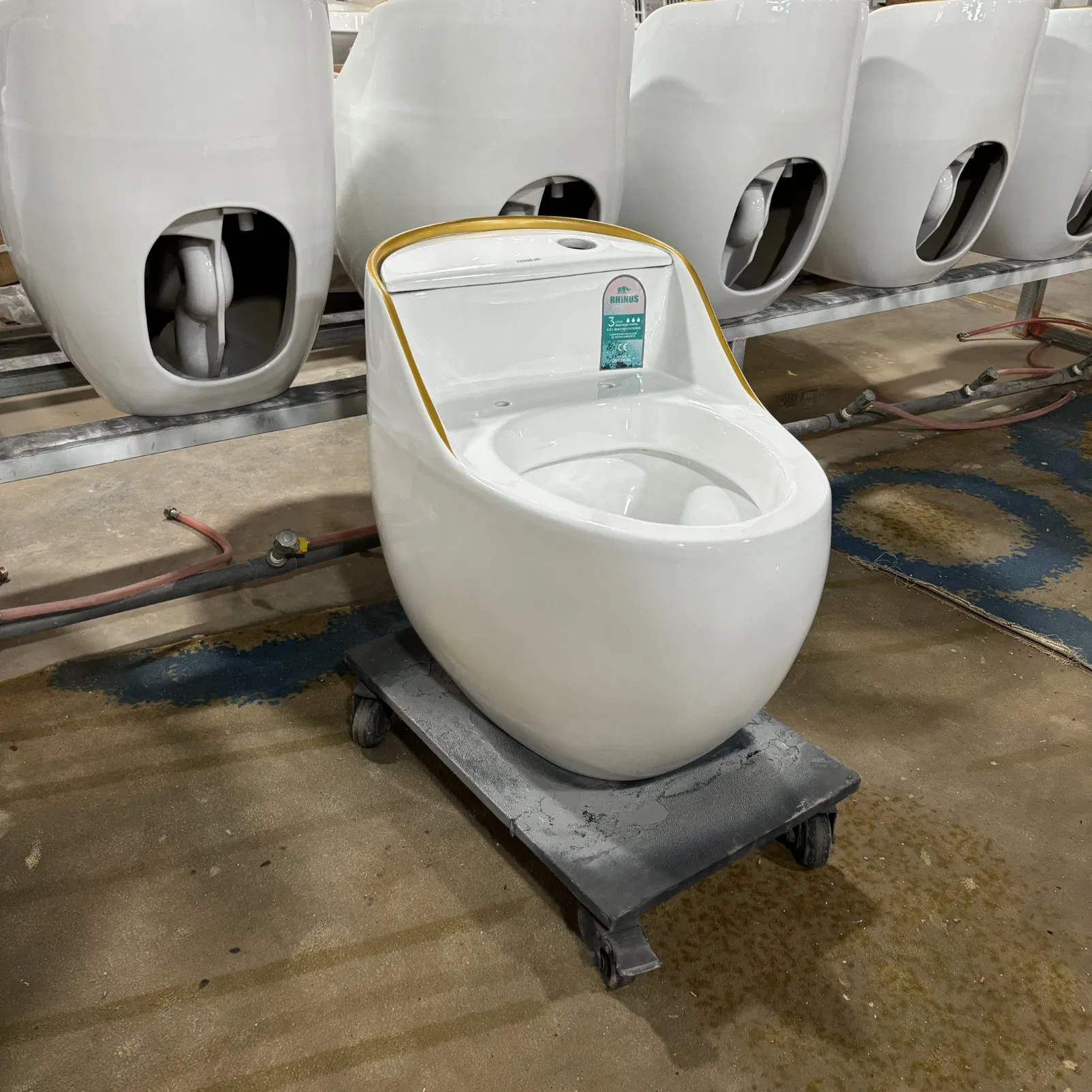 Luxury Gold Line Egg Shape One Piece Tornado Siphonic Ceramic Toilet