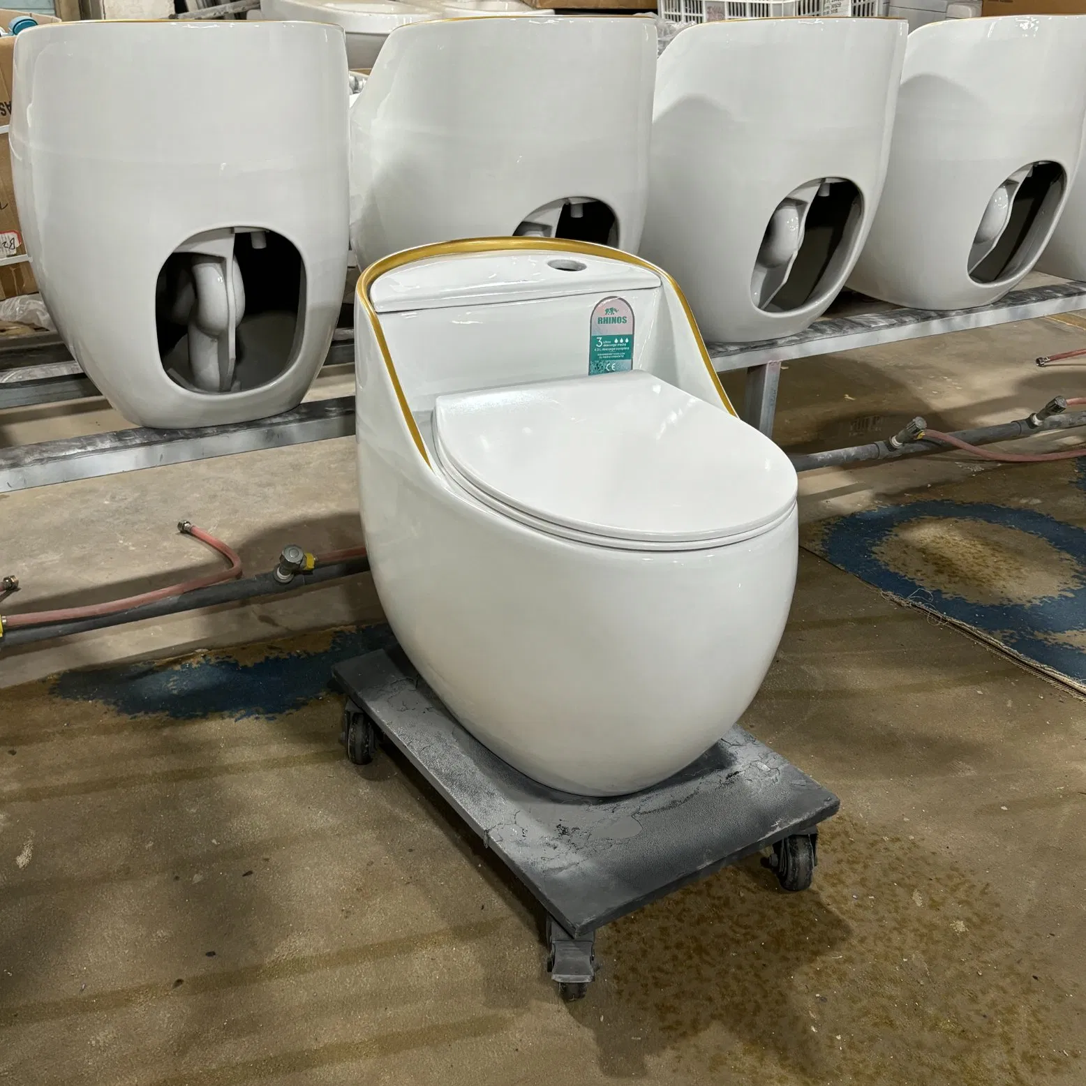 Luxury Gold Line Egg Shape One Piece Tornado Siphonic Ceramic Toilet