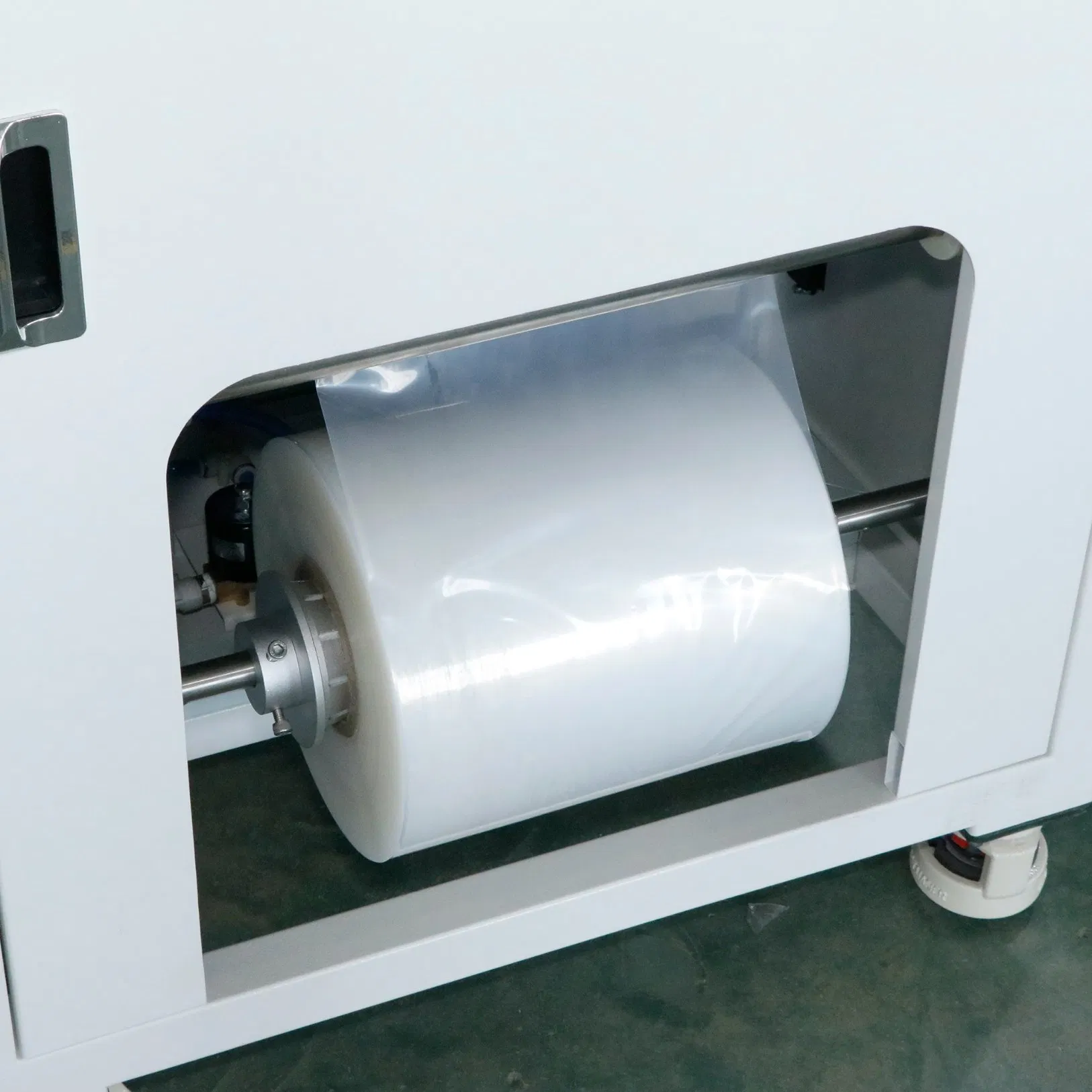 Good Quality PE Film Packing Machine for Plastic Parts Rubber Material Package