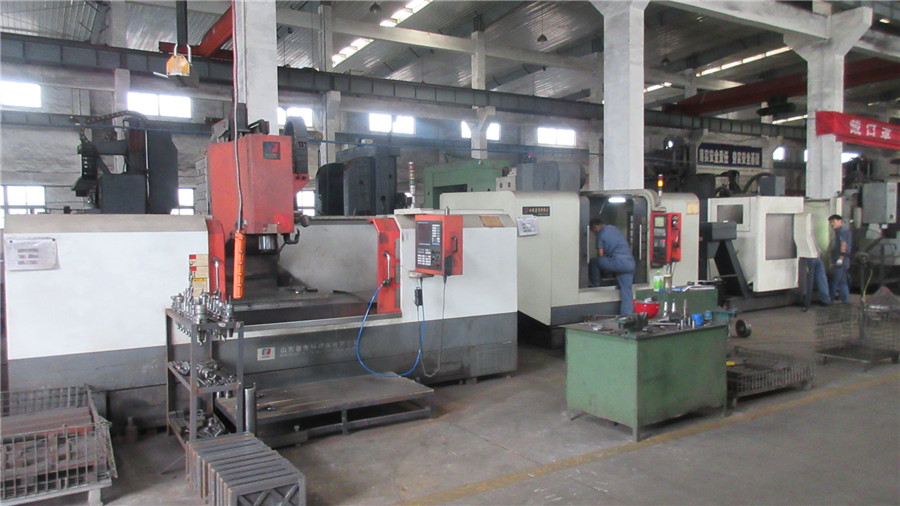 CNC machining operations for precision stone cutting machine components